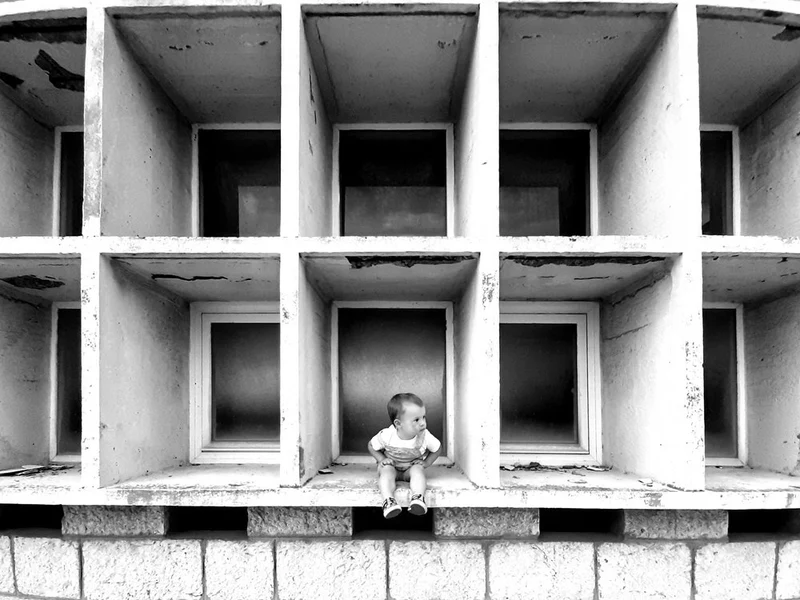 Little One in Concrete Grid