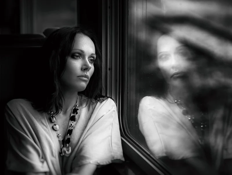 Pensive Train Window