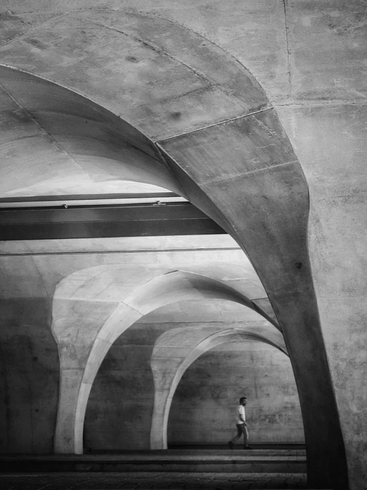 Man Under Concrete Arches