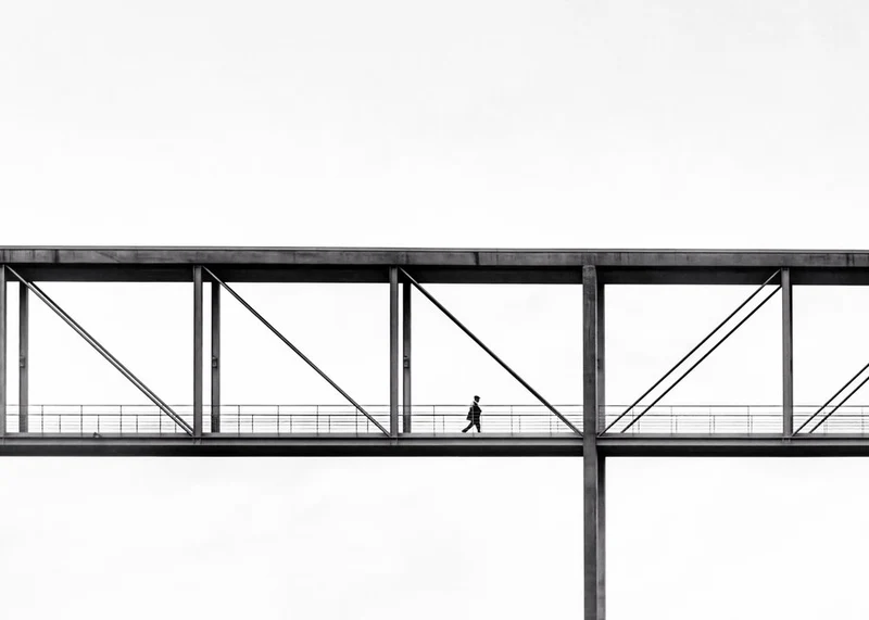 Man on Modern Bridge