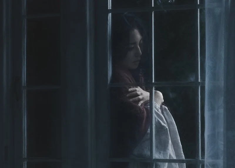 Quiet Woman By Window