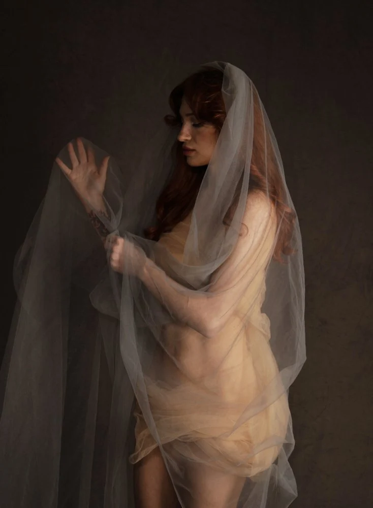 Ethereal Veiled Woman