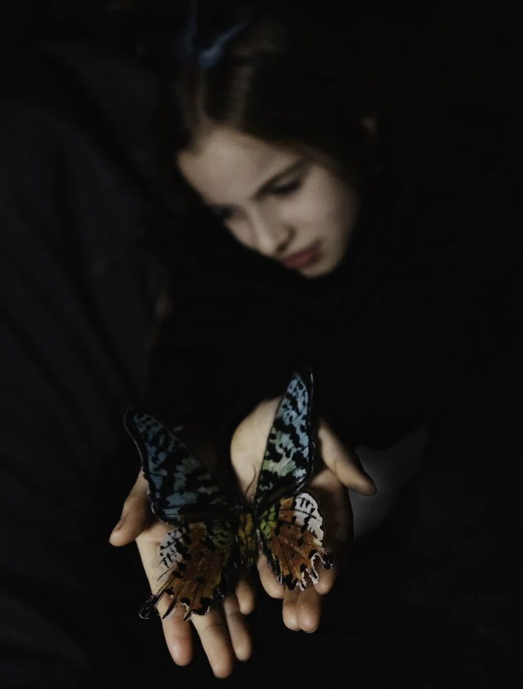Contemplative Girl Butterfly