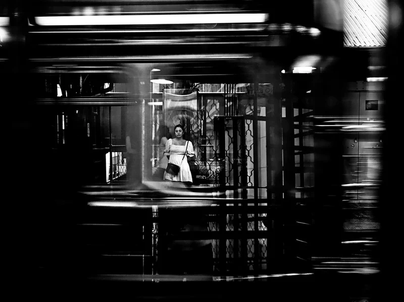 Woman in Urban Reflection