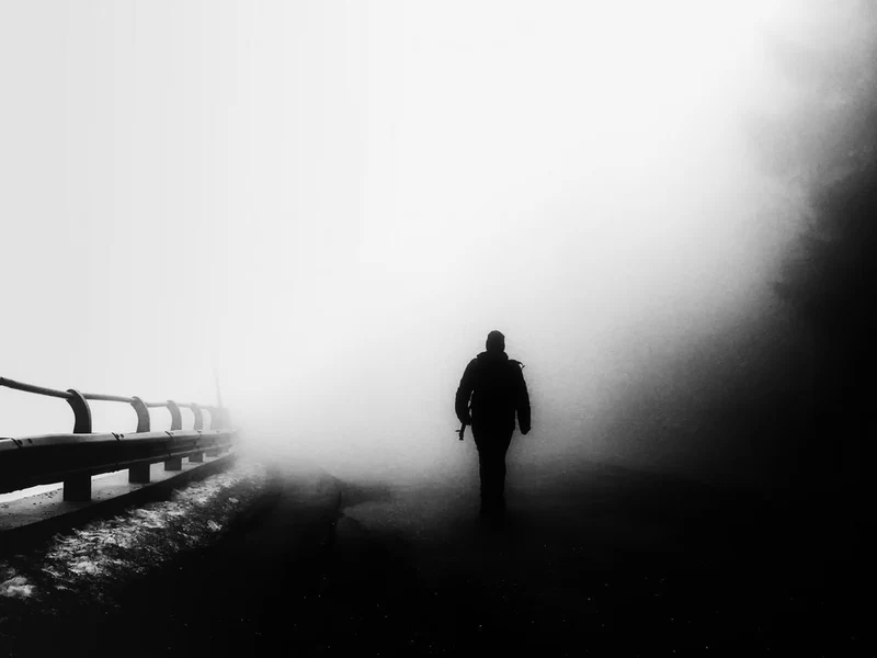 Lone Figure In Fog