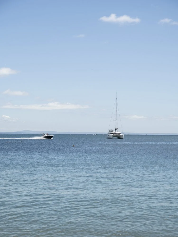 Speedboat and Sailboat