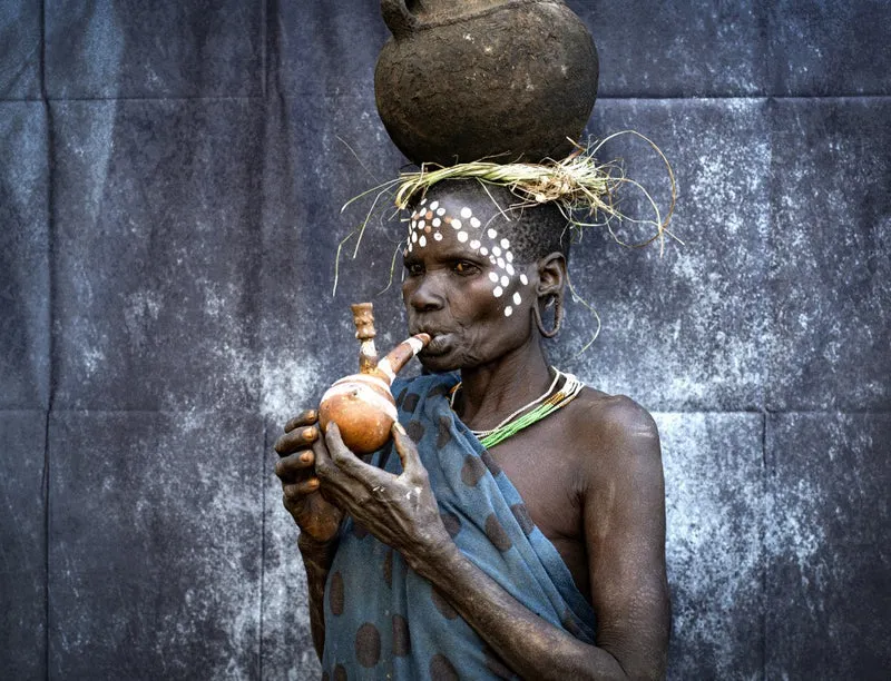 Old woman with a Pipe