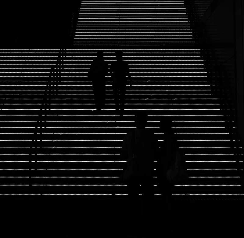 Silhouettes on Glowing Stairs