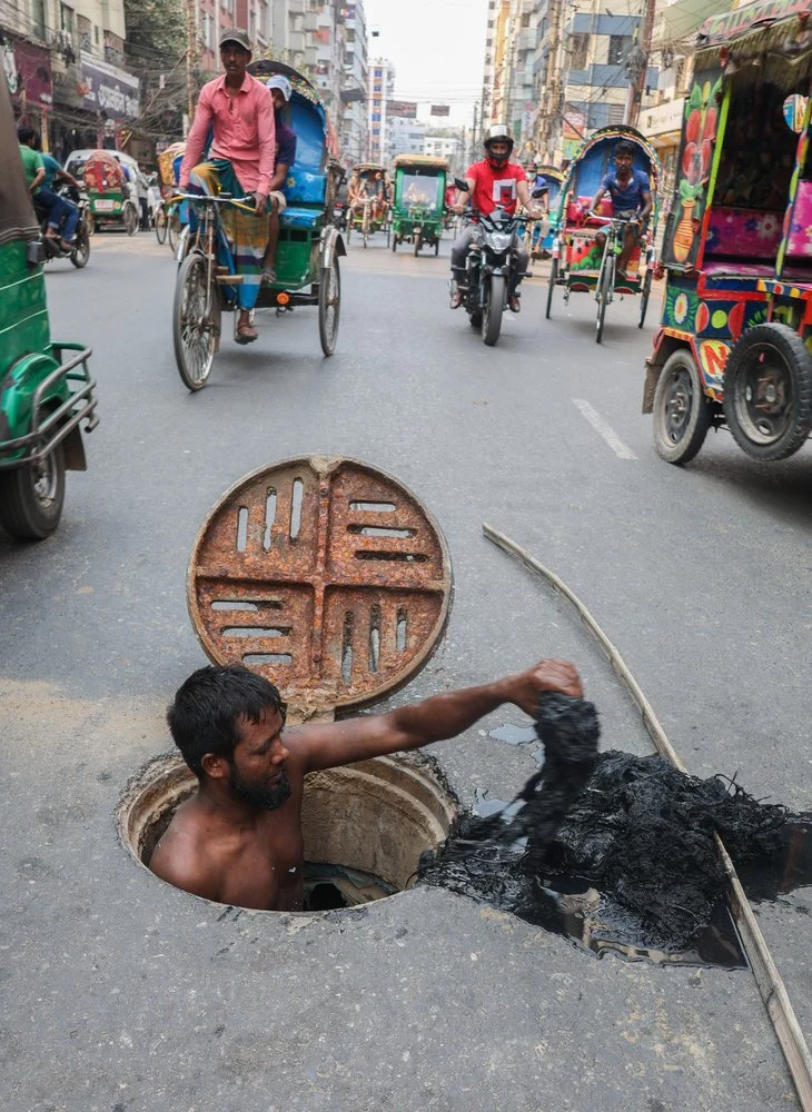 City Street Drain Worker