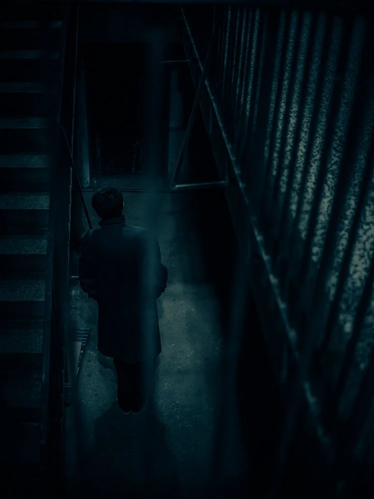 Man In Dark Stairwell
