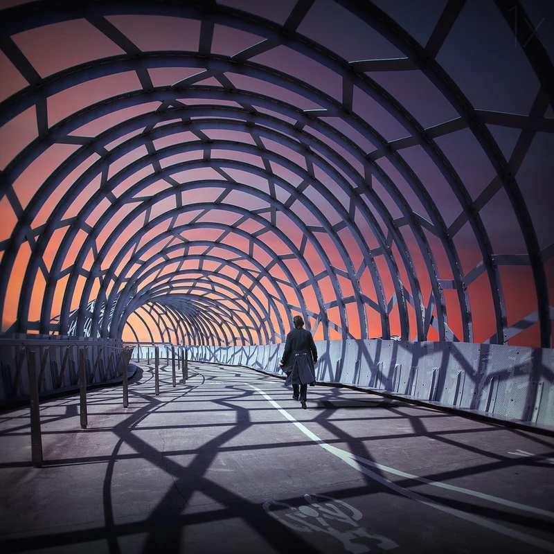 Solitary Walk Through Arches