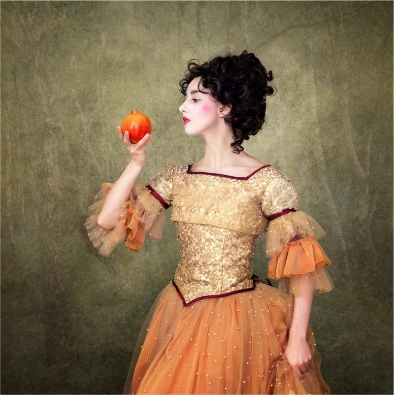 The Lady Loves Pomegranates