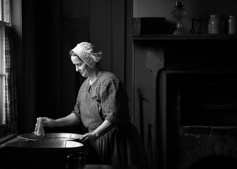 The Lady working in a Kitchen